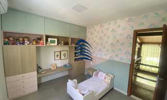 Imagem 6: Casa com arquitetura rustica, bastante madeira e vidro na sua fachada