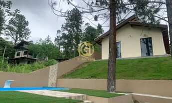 Imagem 3: Casa em Caraguatatuba com 3 quartos sendo 1 suíte , possui piscina e churrasqueira, aceita