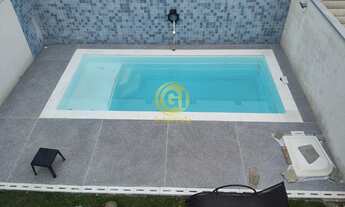 Imagem 2: Linda casa com piscina privativa, ideal para quem busca conforto e lazer. A casa oferece 2