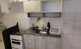 Imagem 6: 3 DORMITÓRIOS SENDO 1 SUÍTE SALA DE ESTAR C/ VENTILADOR DE TETO E UM RACK COZINHA C/ PLANE