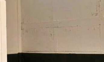 Imagem 6: Com um terreno amplo de 562 m² e uma área construída de 422,80 m², esta propriedade é o es