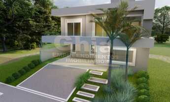 Imagem 2: CASA EM CONSTRUÇÃO TIPO SOBRADO COM: 05 suítes, sendo 04 no piso superior e 01 suíte no