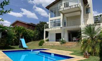 Imagem 2: Casa clean, com ambientes integrados, muito lazer privativo e localizada no Condomínio Par