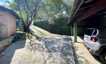 Imagem 3: Linda casa rústica integrada e avarandada com detalhes em tijolos aparentes, total privaci