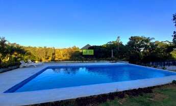 Imagem 2: Casa térrea com vista deslumbrante para a natureza. Localizada em um charmoso condomínio p