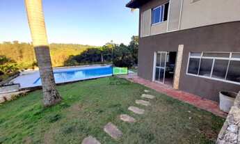 Imagem 5: Casa térrea com vista deslumbrante para a natureza. Localizada em um charmoso condomínio p