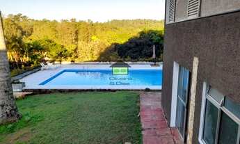 Imagem 7: Casa térrea com vista deslumbrante para a natureza. Localizada em um charmoso condomínio p