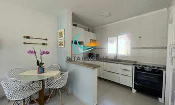 Imagem 3: Localizada em um bairro tranquilo e familiar, essa casa de 2 suítes é perfeita para quem b