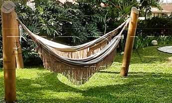 Imagem 5: Casa de temporada em condomínio com piscina e espaço gourmet, a 130 metros da Praia do Láz