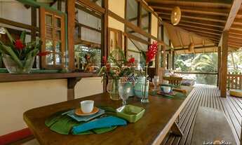 Imagem 6: Ótima casa em estilo rústico, pé na areia, com 3 dormitórios e espaço gourmet, na praia Gr