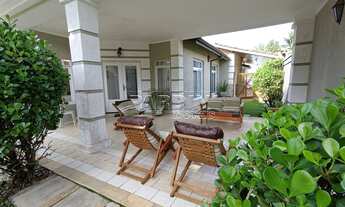 Imagem 3: Excelente casa em condomínio com 4 suítes, varanda gourmet e piscina, na praia do Lázaro e