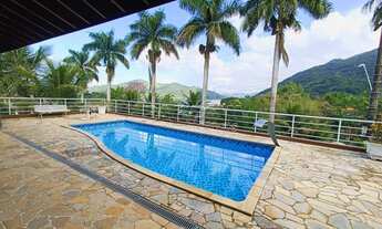 Imagem 2: Ótima casa em condomínio com 6 dormitórios, varanda gourmet e piscina, na praia da Santa R