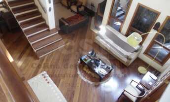 Imagem 3: Imóvel com 22 anos com projeto moderno em revestimento de madeira nobre ( Ipê , Mogno ) Ru