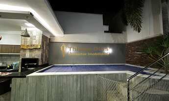 Imagem 3: Casa moderna, alto padrão e com fino acabamento com piscina, churrasqueira e 3 dormitórios