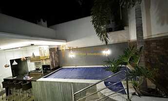 Imagem 2: Casa moderna, alto padrão e com fino acabamento com piscina, churrasqueira e 3 dormitórios