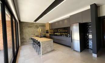 Imagem 3: Casa moderna com cozinha gourmet com churrasqueira, piscina e ampla varanda á venda no bai