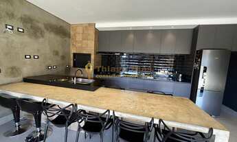 Imagem 7: Casa moderna com cozinha gourmet com churrasqueira, piscina e ampla varanda á venda no bai