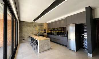 Imagem 5: Casa moderna com cozinha gourmet com churrasqueira, piscina e ampla varanda á venda no bai