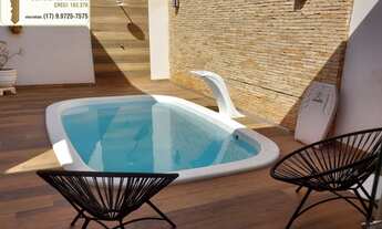 Imagem 3: Casa á venda com 3 dormitórios, cozinha gourmet com churrasqueira e piscina no bairro Jard