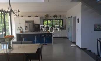 Imagem 5: Casa de condomínio para locação com 4 quartos, sendo 2 suítes, e 3 salas amplas e arejadas