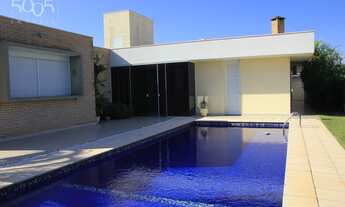 Imagem 2: Casa à venda no Condomínio Plaza Athenee, com 423m² de área construída e 1046m² de terreno