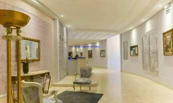 Imagem 2: Conjunto comercial 110m² e 02 banheiros. Condomínio com recepção e segurança. Excelente