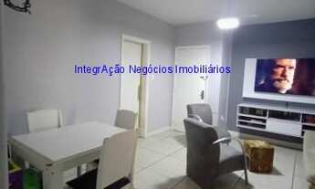 Imagem 3: Apartamento 71m² 2 dormitórios, 2 banheiros. Sala ampla, cozinha em L, área de serviço com