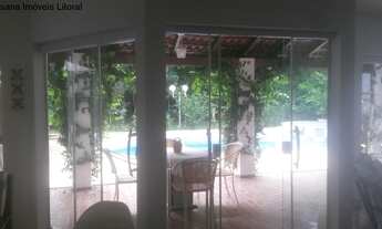 Imagem: Casa com 4 suítes estilo sobrado com piscina