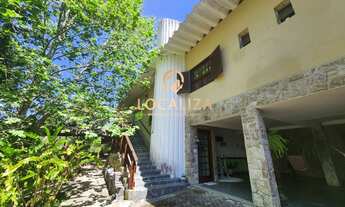 Imagem: Casa de luxo em condomínio com 4 salas