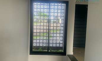 Imagem 4: Residência de Luxo com 3 Suítes e Espaço Gourmet no Condomínio