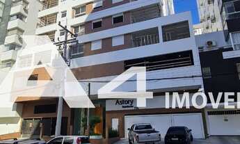 Imagem: Dois dormitórios, sem mobília, prédio