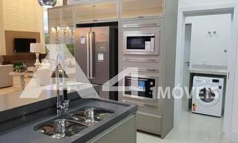 Imagem 2: Mansão com piscina em concreto mob. e decorada