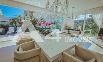 Imagem 6: Mansão com piscina em concreto mob. e decorada