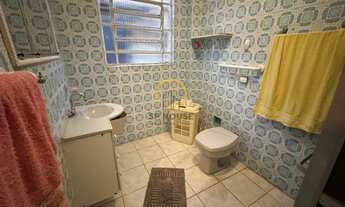 Imagem 6: Terreno com 2 casas térreas, garagem coberta com 4 vagas, lavanderia e edícula