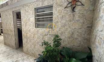 Imagem 7: Terreno com 2 casas térreas, garagem coberta com 4 vagas, lavanderia e edícula