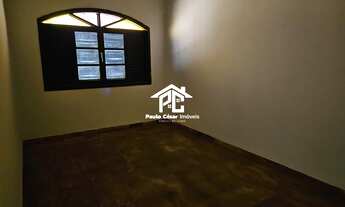 Imagem 3: Casa com 3 quartos sendo 1 suíte, sala em L, banheiro, cozinha , garagem coberta, churrasq