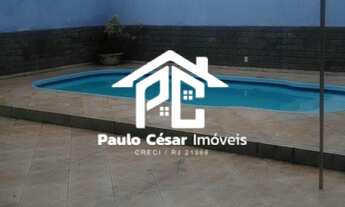 Imagem 5: Casa composta por 3 quartos, sendo 3 suítes, escritório, sala ampla com dois ambientes, Co