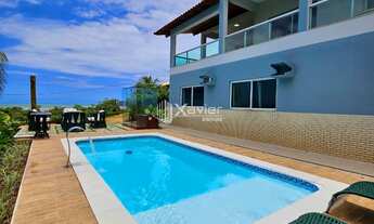 Imagem 5: Casa Triplex de Alto Padrão em Condomínio Fechado com Vista Mar e Acesso Privativo à Praia