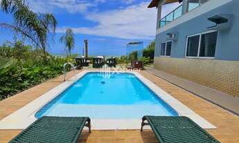 Imagem 4: Casa Triplex de Alto Padrão em Condomínio Fechado com Vista Mar e Acesso Privativo à Praia