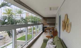 Imagem 7: Apartamento na Riviera com varanda gourmet envidraçada com vista para o mar