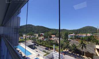 Imagem 3: Prédio frente ao mar no centro de Bertioga com 2 dormitórios, 1 suíte, 2 vagas de garagem