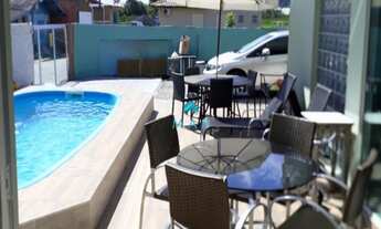 Imagem 4: Casa em Terreno Individual à Venda em Ponta das Canas, contendo 4 dormitórios sendo 2 suít