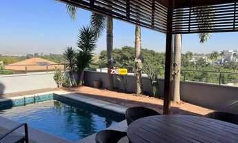 Imagem 4: LINDA CASA A VENDA COM EXCELENTE ACABAMENTO 5 SUÍTES CONDOMÍNIO RESIDENCIAL JARDIM PARADIS