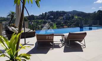 Imagem: Mansão com adega, elevador e piscina, à