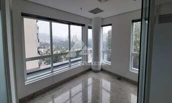 Imagem 7: Sala com piso de granito e divisórias de vidro, à venda no Edifício Monte Carlo, na Alamed