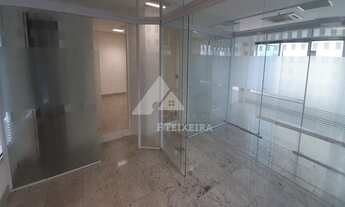 Imagem 5: Sala com piso de granito e divisórias de vidro, à venda no Edifício Monte Carlo, na Alamed