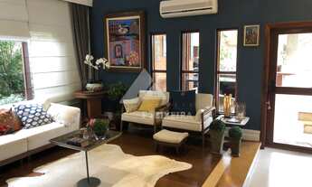 Imagem 2: Sobrado com salas amplas e integradas à venda no residencial 02, em Alphaville