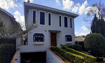 Imagem 1: Sobrado com 4 suítes, closet, amplo living, lareira, home cinema, espaço gourmet, piscina