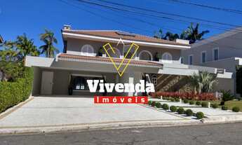 Imagem 1: Exclusivo e recém reformado sobrado de 4 suítes em Alphaville com piscina, churrasqueira