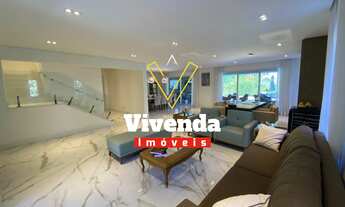 Imagem 3: Sua nova casa de alto padrão em Alphaville: 4 suítes, 6 garagens e muito espaço